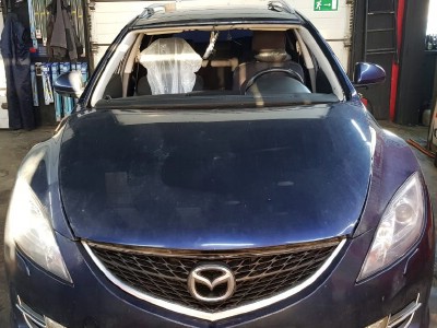 Установка лобового стекла Mazda 2007-2012
